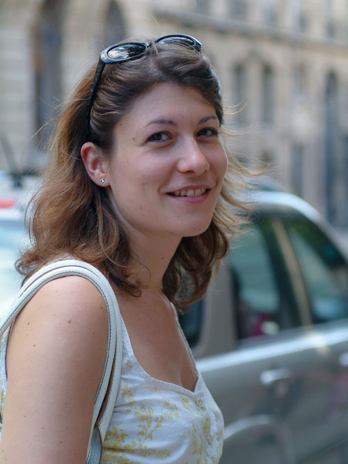 Aude smiles in the street