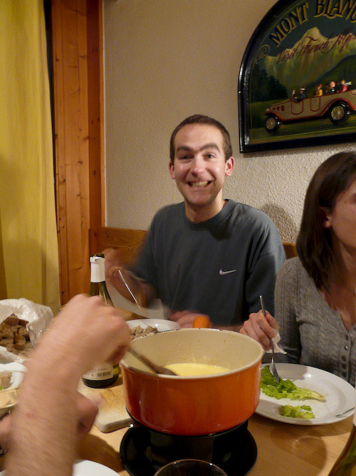 Francois tucks into the fondue